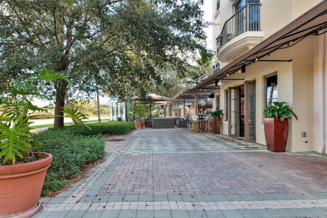 view of patio / terrace with a balcony