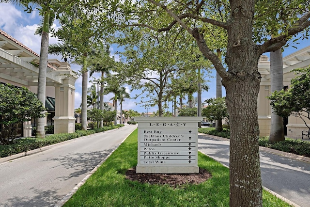 exterior space featuring decorative columns