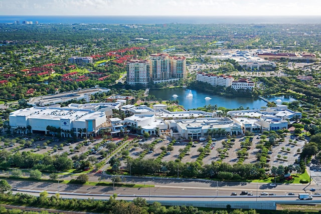 aerial view featuring a water view and a view of city