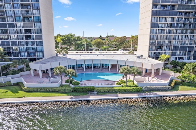 136 Lakeshore Dr Unit Ph-13, North Palm Beach, FL 33408 - exterior space with a pool, a water view, and a patio area