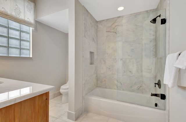 full bath featuring washtub / shower combination, vanity, toilet, and baseboards