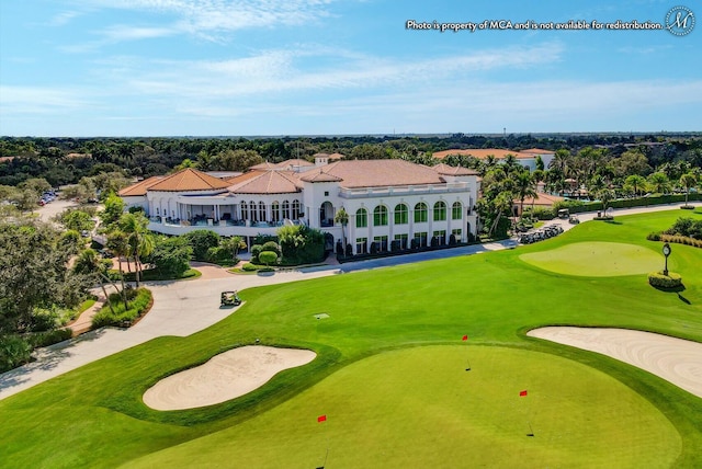 drone / aerial view featuring view of golf course