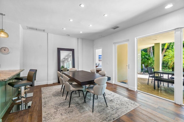 225 NW 11th St, Delray Beach, FL 33444 - dining space featuring recessed lighting, dark wood finished floors, and baseboards