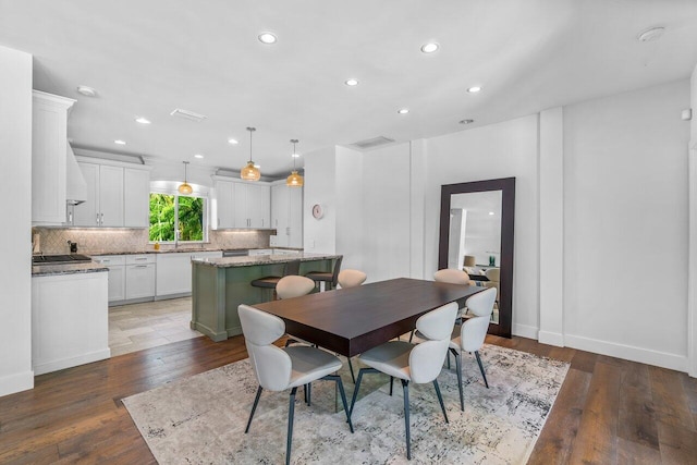 225 NW 11th St, Delray Beach, FL 33444 - dining space featuring hardwood / wood-style flooring, recessed lighting, and baseboards