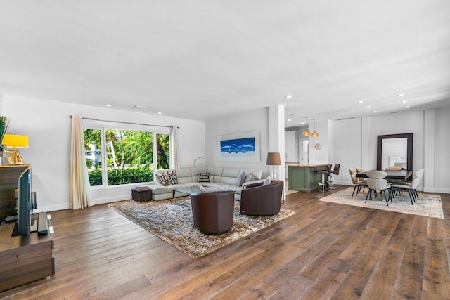 225 NW 11th St, Delray Beach, FL 33444 - living area featuring dark wood-style floors, recessed lighting, and baseboards