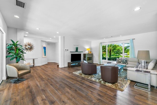 225 NW 11th St, Delray Beach, FL 33444 - living room with wood finished floors, recessed lighting, and baseboards