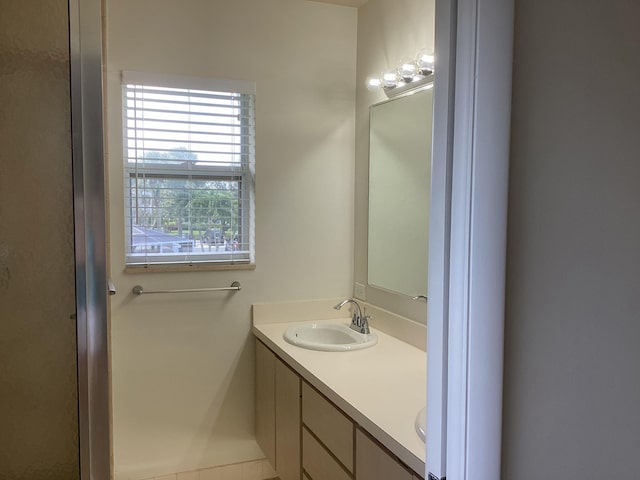 2415 SW Danbury Ln, Palm City, FL 34990 - full bath with double vanity and a sink