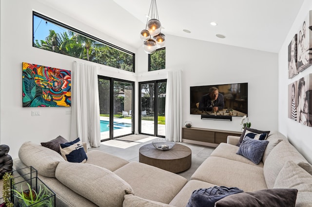 tiled living room with high vaulted ceiling