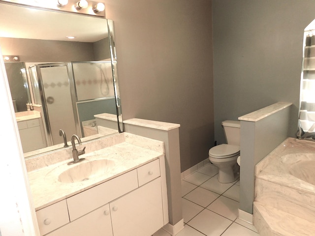 17609 72nd Rd N, The Acreage, FL 33470 - full bathroom featuring toilet, a stall shower, vanity, and tile patterned flooring