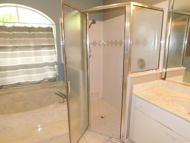 17609 72nd Rd N, The Acreage, FL 33470 - full bath with a stall shower, a bathtub, and vanity