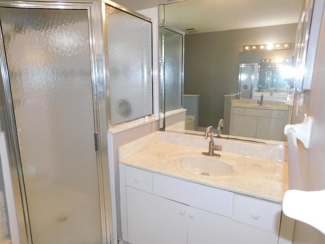 17609 72nd Rd N, The Acreage, FL 33470 - full bathroom featuring vanity, visible vents, and a stall shower