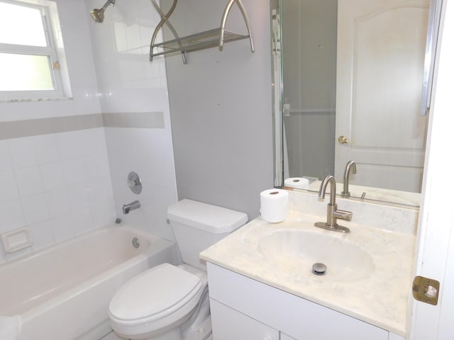 17609 72nd Rd N, The Acreage, FL 33470 - bathroom featuring bathing tub / shower combination, vanity, and toilet