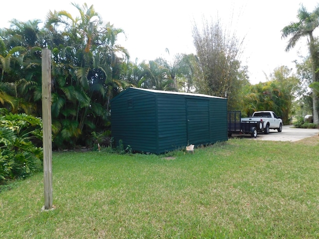 17609 72nd Rd N, The Acreage, FL 33470 - view of yard featuring a shed and an outbuilding