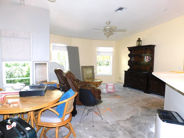 17609 72nd Rd N, The Acreage, FL 33470 - interior space featuring concrete floors, visible vents, and a ceiling fan