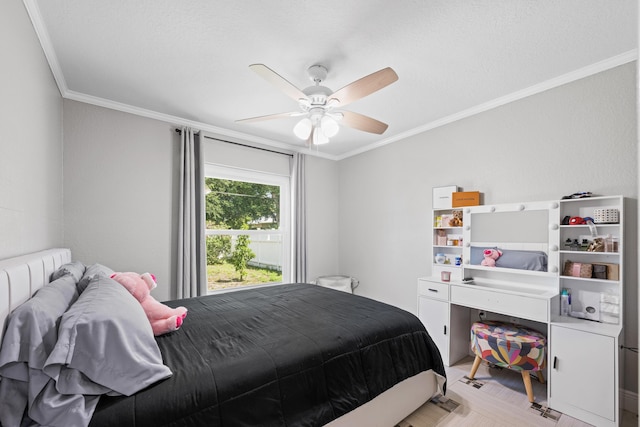 bedroom featuring crown molding and ceiling fan