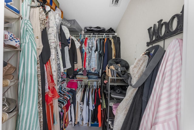 walk in closet with visible vents