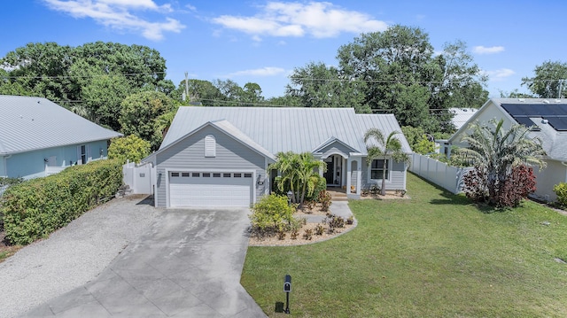 single story home featuring a garage, metal roof, a front yard, fence, and driveway