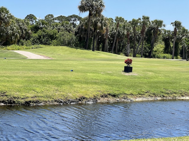 4220 Gator Trace Ave Unit 5E, Fort Pierce, FL 34982 - surrounding community featuring a yard and golf course view