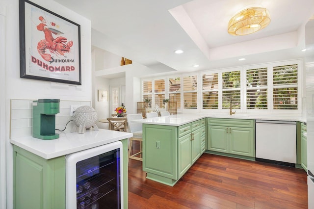 8110 Oakton Ct Unit 10B, Lake Clarke Shores, FL 33406 - bar area featuring beverage cooler, dishwasher, recessed lighting, dark wood finished floors, and a sink