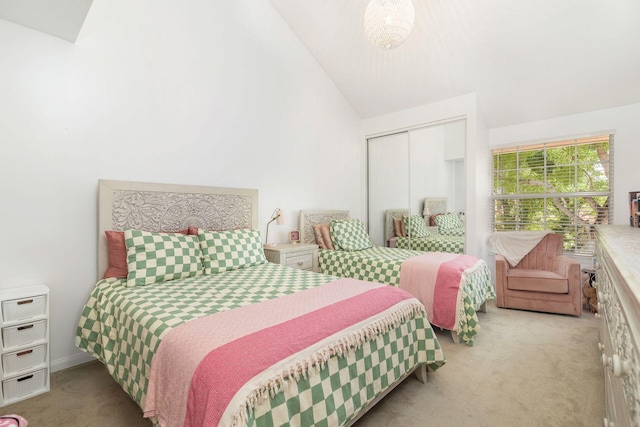8110 Oakton Ct Unit 10B, Lake Clarke Shores, FL 33406 - bedroom with carpet, a closet, and high vaulted ceiling