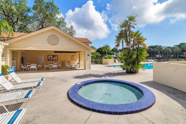 8110 Oakton Ct Unit 10B, Lake Clarke Shores, FL 33406 - community pool featuring a community hot tub and a patio area