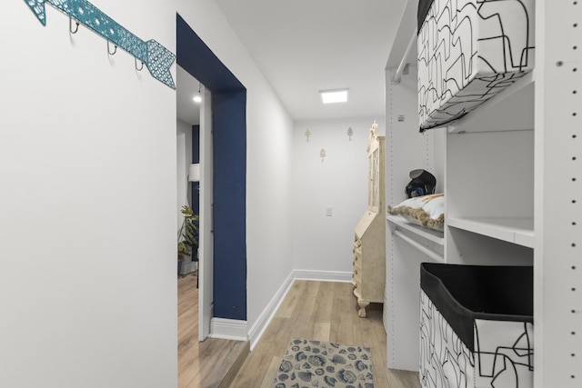 944 Hansen St, West Palm Beach, FL 33405 - hallway featuring light wood-style flooring and baseboards