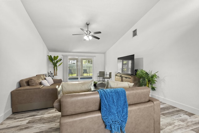 944 Hansen St, West Palm Beach, FL 33405 - living room with wood finished floors, ceiling fan, baseboards, and lofted ceiling