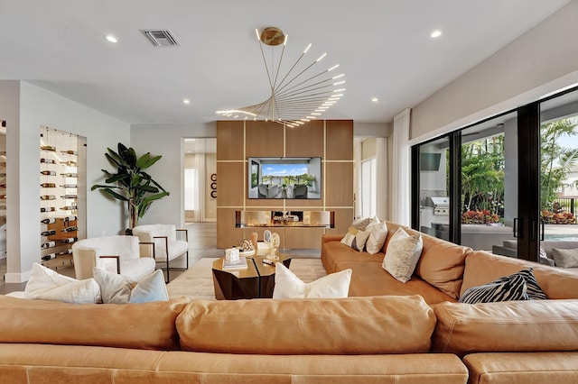 17045 Five Waters Ave, Boca Raton, FL 33496 - living area with a chandelier, visible vents, and recessed lighting