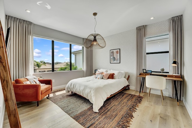 17045 Five Waters Ave, Boca Raton, FL 33496 - bedroom featuring baseboards, recessed lighting, and wood finished floors