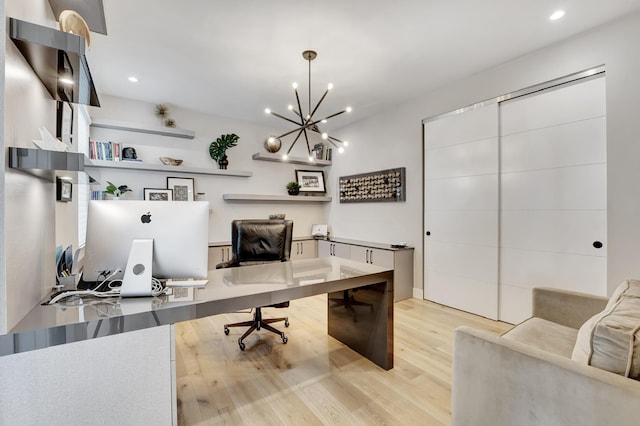 17045 Five Waters Ave, Boca Raton, FL 33496 - office area featuring light wood-style flooring, an inviting chandelier, and recessed lighting