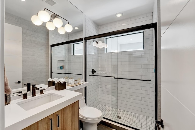 17045 Five Waters Ave, Boca Raton, FL 33496 - full bath featuring visible vents, toilet, a stall shower, and vanity