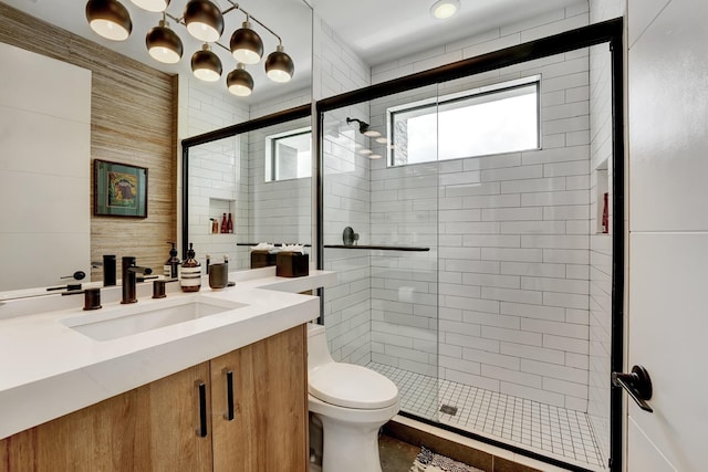 17045 Five Waters Ave, Boca Raton, FL 33496 - bathroom with vanity, a stall shower, and toilet
