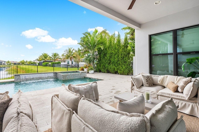 17045 Five Waters Ave, Boca Raton, FL 33496 - view of pool featuring an outdoor living space, a pool with connected hot tub, a fenced backyard, a ceiling fan, and a patio