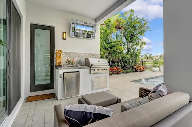 17045 Five Waters Ave, Boca Raton, FL 33496 - view of patio / terrace with fence, grilling area, an outdoor kitchen, and outdoor lounge area