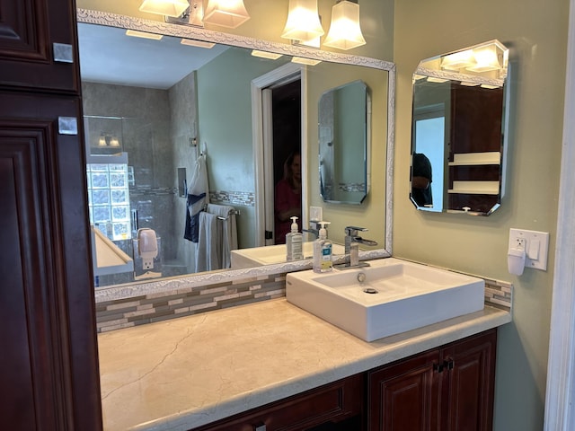 full bathroom with vanity and a stall shower