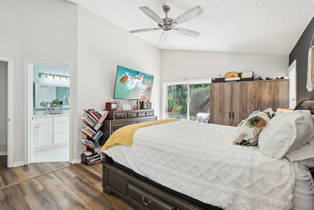 bedroom featuring connected bathroom, a textured ceiling, vaulted ceiling, and dark wood-type flooring