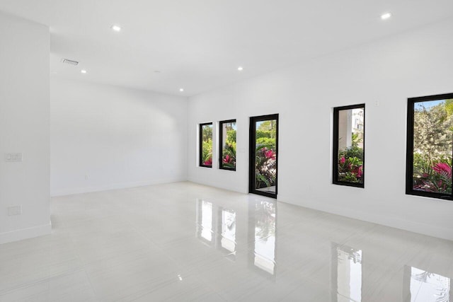 306 Plymouth Rd, West Palm Beach, FL 33405 - unfurnished room with recessed lighting, visible vents, and a healthy amount of sunlight