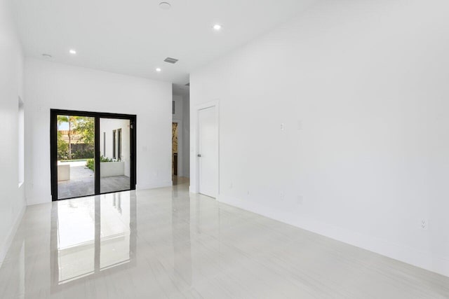 306 Plymouth Rd, West Palm Beach, FL 33405 - empty room with baseboards, visible vents, and recessed lighting