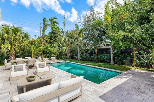 306 Plymouth Rd, West Palm Beach, FL 33405 - view of swimming pool with a patio area, a fenced backyard, outdoor lounge area, and a fenced in pool