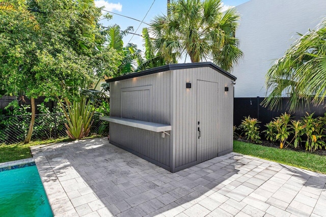 306 Plymouth Rd, West Palm Beach, FL 33405 - view of shed with a fenced backyard