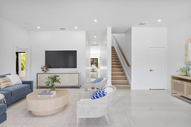 306 Plymouth Rd, West Palm Beach, FL 33405 - living area with recessed lighting, plenty of natural light, and stairway