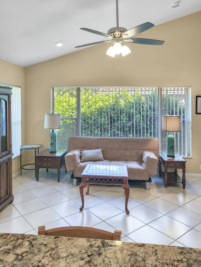12404 Lakeridge Falls Dr, Boynton Beach, FL 33437 - living area with vaulted ceiling, a ceiling fan, and light tile patterned flooring
