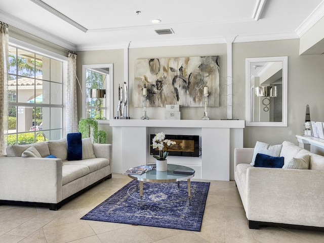 12404 Lakeridge Falls Dr, Boynton Beach, FL 33437 - tiled living room featuring a glass covered fireplace, visible vents, and crown molding