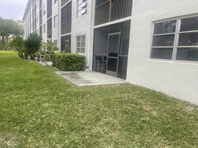 exterior space with a lawn