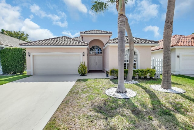 6090 Newport Village Way, Lake Worth, FL 33463 - mediterranean / spanish house featuring a tiled roof, driveway, a garage, and stucco siding