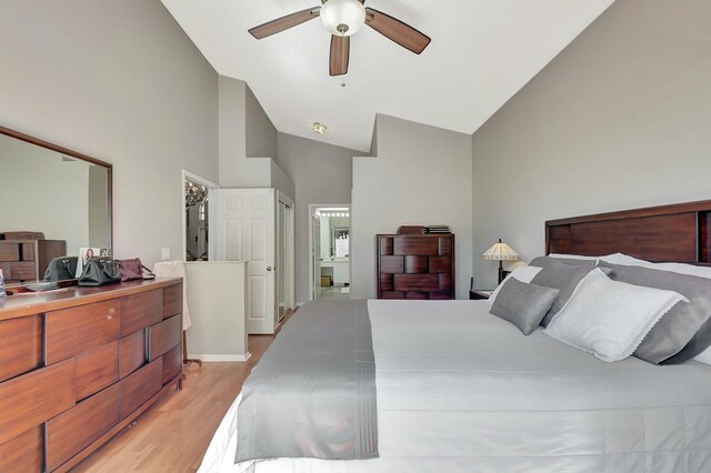 6090 Newport Village Way, Lake Worth, FL 33463 - bedroom featuring ceiling fan, high vaulted ceiling, and light wood-style floors