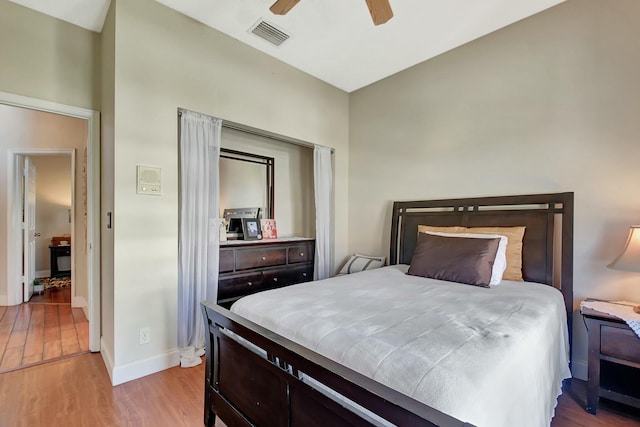 6090 Newport Village Way, Lake Worth, FL 33463 - bedroom with visible vents, baseboards, light wood finished floors, and ceiling fan