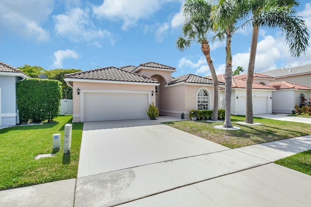 6090 Newport Village Way, Lake Worth, FL 33463 - mediterranean / spanish house featuring concrete driveway, stucco siding, a front lawn, a garage, and a tiled roof