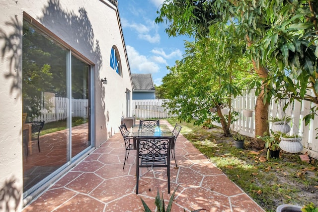 6090 Newport Village Way, Lake Worth, FL 33463 - view of patio with fence private yard