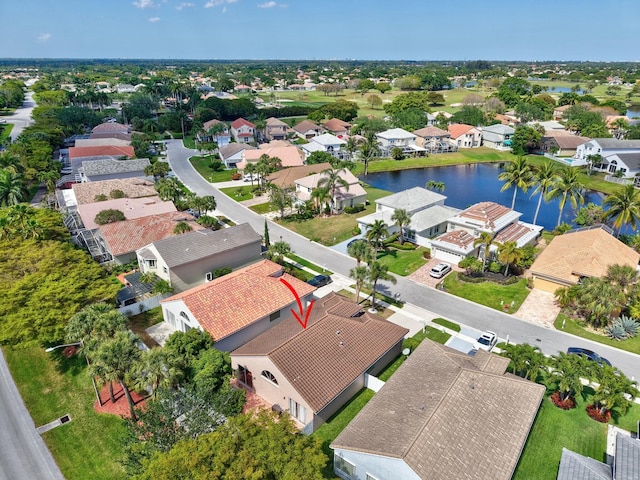 6090 Newport Village Way, Lake Worth, FL 33463 - drone / aerial view featuring a residential view and a water view